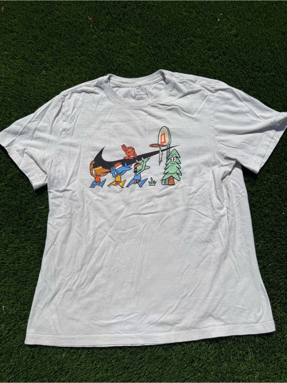 Vintage style Nike White Graphic Crewneck T-Shirt with swoosh cartoon